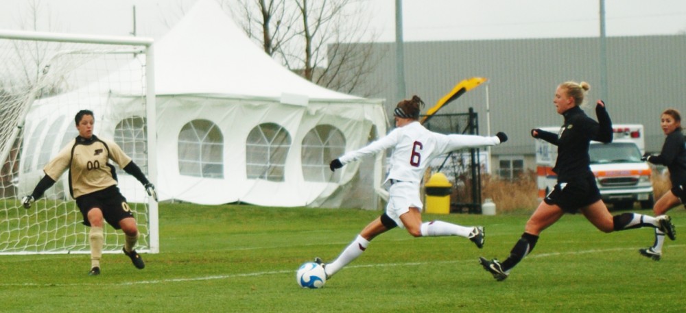 Sophomore forward Molly Rouse puts some foot behind a ball during Friday’s 1-0 semi-final win over Purdue. 