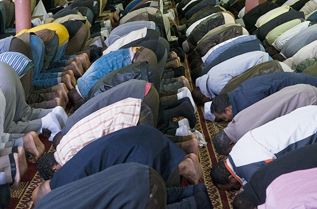 Muslims perform prayer at the Abubakar As-Saddique Islamic Center on Friday.