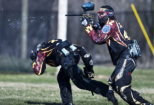 Civil Engineering Senior Nick Johnson, right, and Wildlife Junior Aaron Claus run toward a bunker Saturday during a University of Minnesota Paintball practice in Jordan, Minn. The team is heading to the National Collegiate Paintball Association tournament in Florida. 