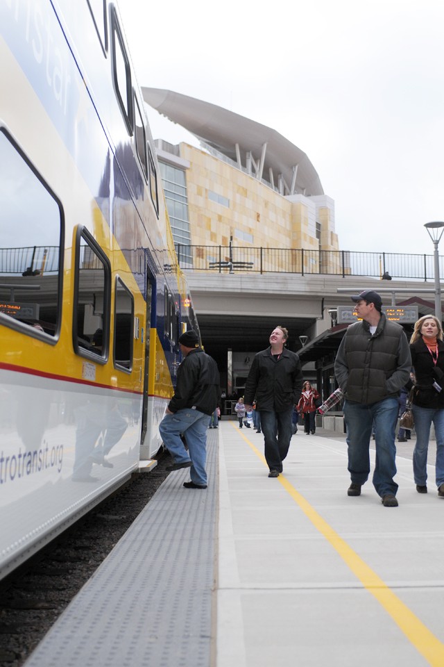 Residents throughout the north metropolitan area celebrate the Northstar line opening on Saturday at Target Field Station in Minneapolis. Metro Transit estimates that nearly 1,700 people will ride the line each weekday with increasing ridership in upcoming years.