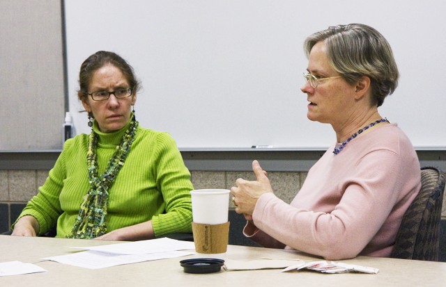 Associate Professor at Humphrey Institute Maria Hanratty, left, and Hennepin County’s Office to End Homelessness representative Lisa Thornquist, right, spoke to a group of graduate students Wednesday at Carlson School of Management. 