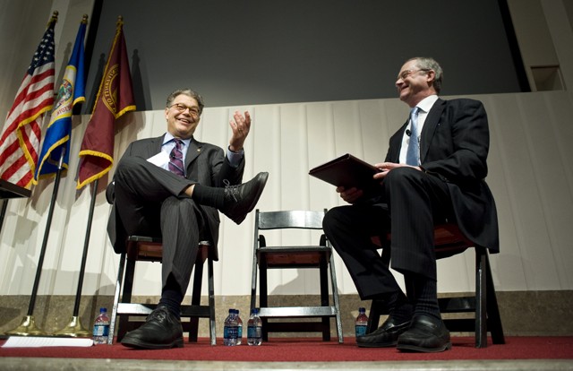 Senator Al Franken speaks with John Finnegan dean of the School of Public Health about healthcare on Friday in the Mayo Memorial Auditorium. The speech and discussion were part of a roundtable titled “Health Care Reform: What Just happened.”