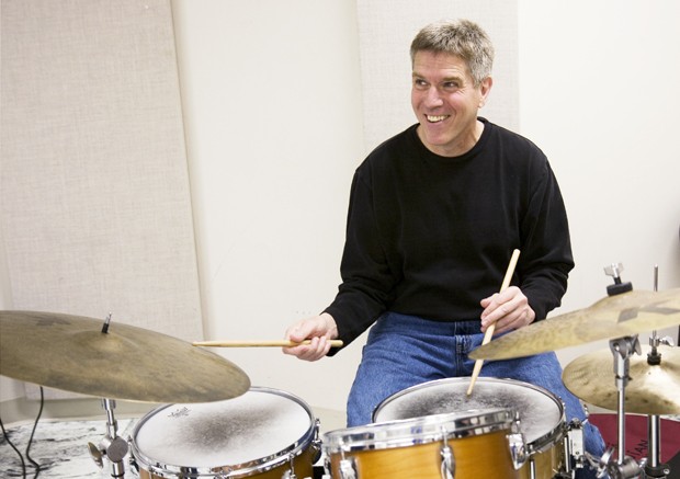 School of Music Teaching Specialist Phil Hey plays drums before his final jazz ensemble class Wednesday in Ferguson Hall. After teaching jazz for 20 years, he is in the process of losing his job due to budget cuts.