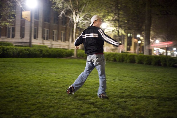 Senior Jack Broadrick plays frisbee on the mall lawn.