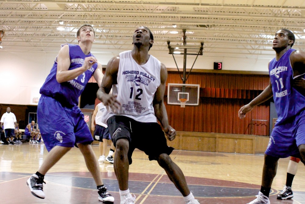 Gophers forward Trevor Mbakwe battles for a rebound at the Howard Pulley Pro Summer League in St. Paul.