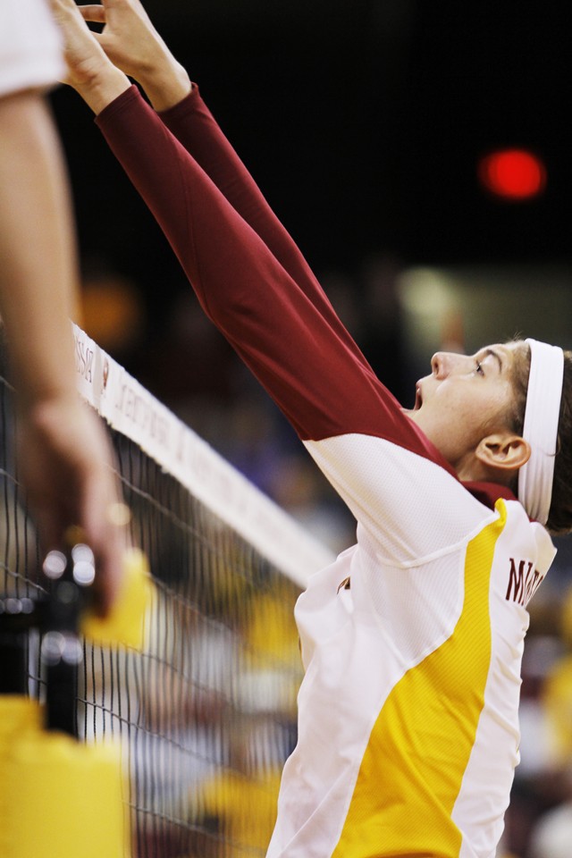 Gophers sophomore outside hitter Tabitha Love at the net last Saturday at the Sports Pavillion.