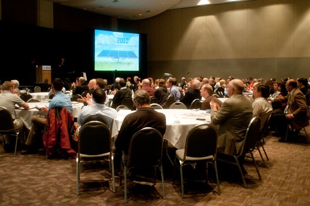 Attendees listen to speakers at the Institute on the Environment’s E3 Conference at the River Center in St. Paul on Wednesday.