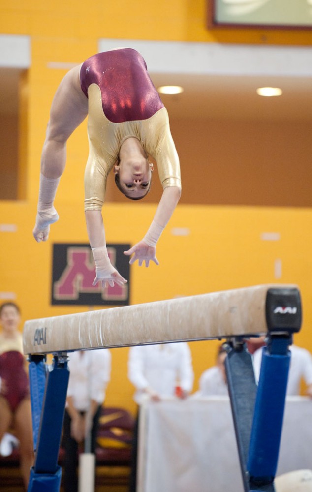 Gopher’s senior Ana Balboa competes on the high beam against Iowa on Saturday in the Sports Pavilion.
