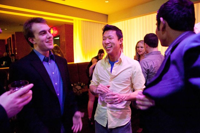 Adam Link, left, and Jake Liu, right,  celebrate Jakes and a friends birthday with Bottle Service at Seven Steakhouse Saturday night in Minneapolis. Bottle Service is something different restaurants do where they give VIP access and mix drinks in the area they provide. Liu helped create a company that will do online booking for Bottle Service starting in June.