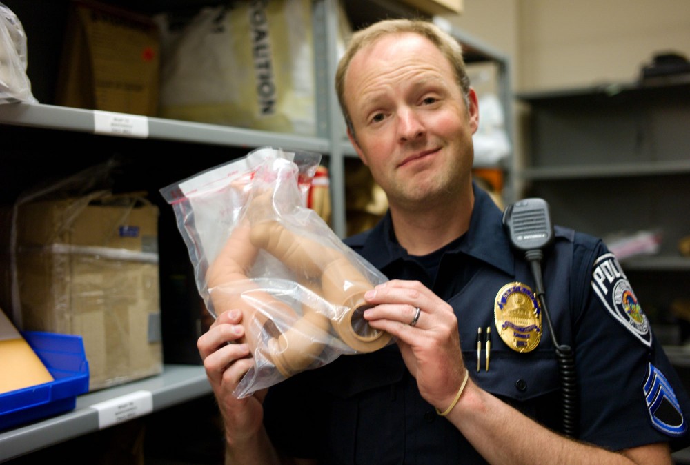 Sergeant Erik Stenemann shows a bag of plastic dolls legs which were connected to a past burglary in the  UMPDs recovered property room. 