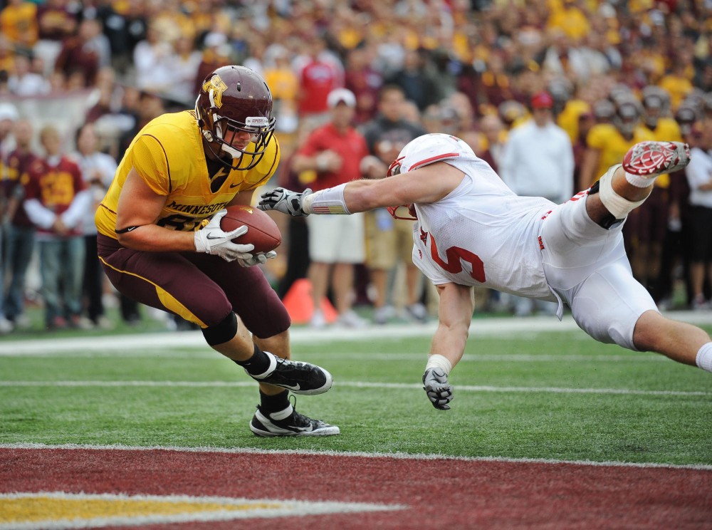 Gophers junior tight end John Rabe scores a touchdown against the Miami Red Hawks Saturday at TCF Bank Stadium.