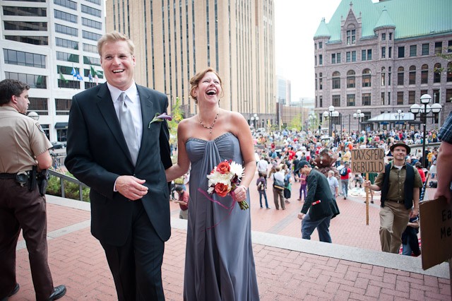 Rolf and Tina Lund pose for wedding photos following their visit to the county clerks office Friday at the Hennepin County Government Center.  We just came out to take a picture… I guess were part of history, Lund said. to take a picture… I guess were part of history, Lund said.