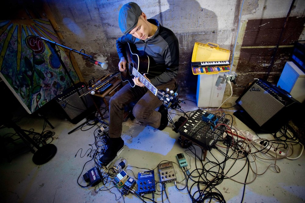 James Everest rehearses for his cd release show in the basement of his home in South Minneapolis Wednesday morning. The cd Blackfish is a live recording of several performances with another musician Joel Pickard from around the country. Each track has its own unique sound from the experimental improvisation of steel and acoustic guitars with different effects and looping pedals.