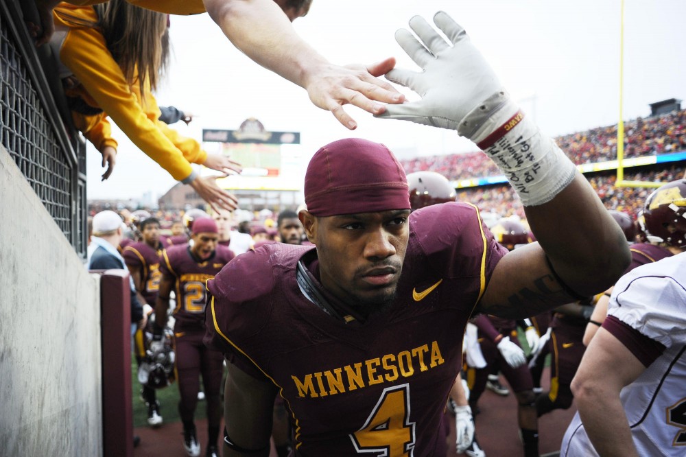 Minnesota linebacker Keanon Cooper makes his way off the field at halftime during Saturdays game against Wisconsin at TCF Bank Stadium.
