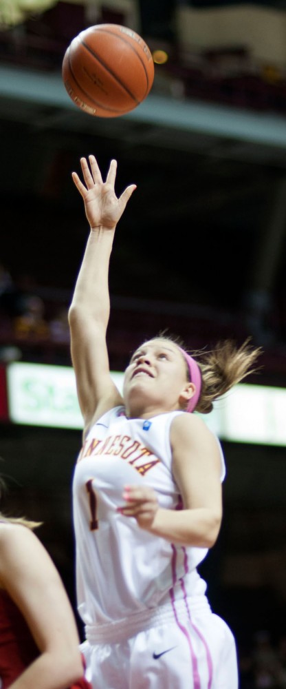 Minnesota guard Rachel Banham goes up for a basket Feb. 13 at Williams Arena.  Banham was named Big Ten Freshman if the Year on Monday.