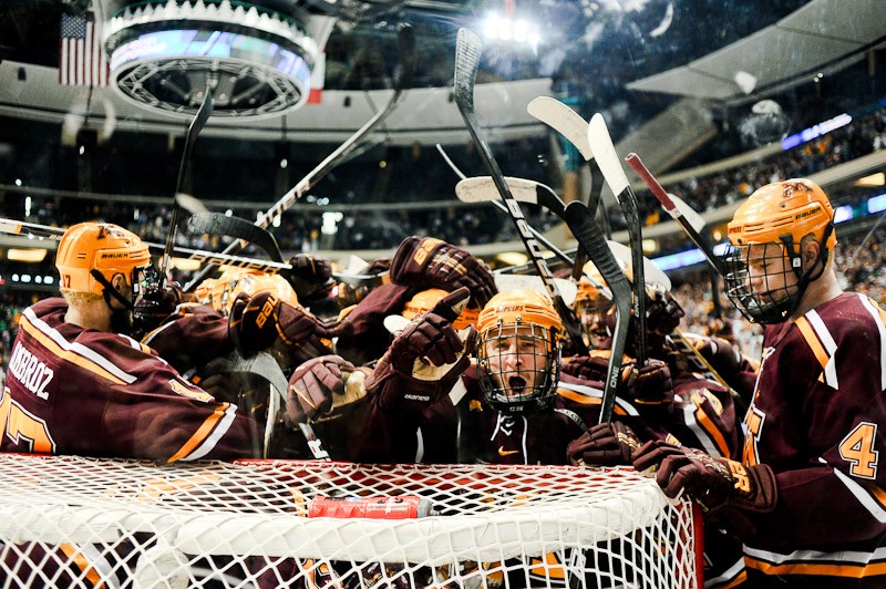 The Gophers mens hockey team piles onto goalie Kent Patterson after defeating North Dakota 5-2 on Sunday at the Xcel Energy Center.  Minnesota will advance to the Frozen Four in Tampa, Fla.