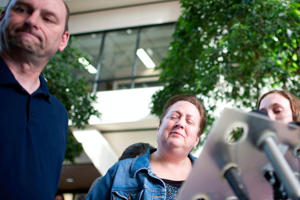 Ann Van Handel, center, mother of Ben Van Handel, tears up at a press conference after a jury convicted Timothy Bakdash of second-degree murder Tuesday at the Hennepin County Government Center. Bakdash hit Ben Van Handel on April 15, 2011 as he drove drunk down Fifth Street Southeast.  Van Handel died six days later from the injuries sustained in the hit-and-run.