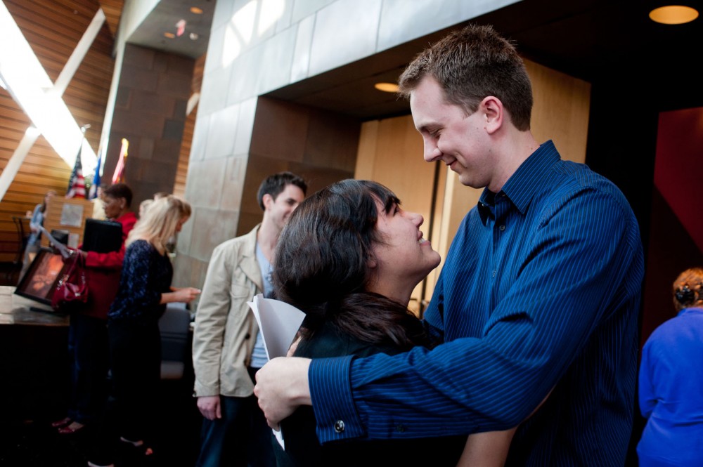 Scott Deeney embraces his wife Sarah after learning his match for his residency program Friday at McNamara Alumni Center. Deeney will be going to the University of Colorado Denver and focusing in surgery.