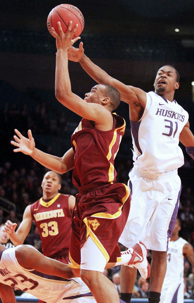 Minnesota guard Andre Hollins came up big in the second half and
the overtime period Tuesday in the Gophers overtime win over
Washington at Madison Square Garden.