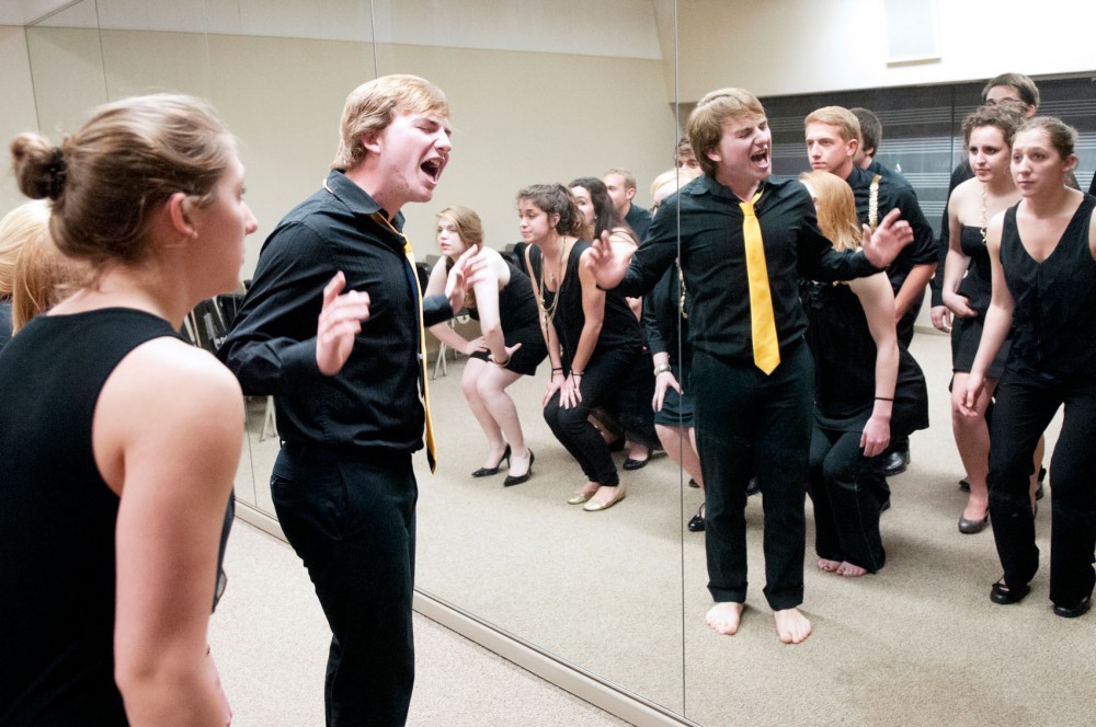 Soloist and university junior Patrick Terry rehearses with the a cappella group 7 Days on Wednesday night in Ferguson Hall.  7 Days is currently preparing to compete in the semifinal round of the International Championship of Collegiate A Cappella tournament in St. Louis.