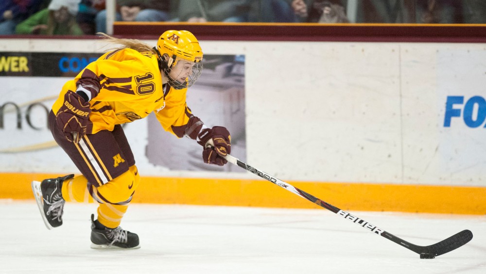 Gophers sophomore Kelly Terry handles a puck during a game against North Dakota Feb. 18 at Ridder Arena.