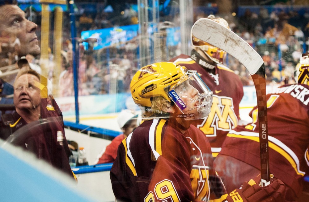 Minnesota defenseman Nate Schmidt watches the clock count down the final seconds of Thursday’s semifinal game against Boston College. The Eagles went on to take the national title Saturday.