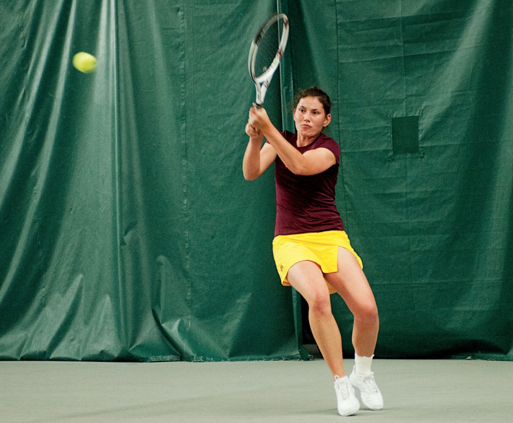 Gophers freshman Tereza Brichacova returns a hit from an Indiana University opponent Friday at the Baseline Tennis Center.  Brichacova won both of her singles matches over the weekend to improve to 10-6.