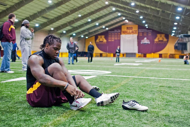 Former Gophers linebacker Gary Tinsley prepares for the next test at Minnesotas Pro Day on Monday at the Gibson/Nagurski Football Complex. Eight players from the Gophers 2011 football team went through a series of drills and measurements in front of NFL scouts. 