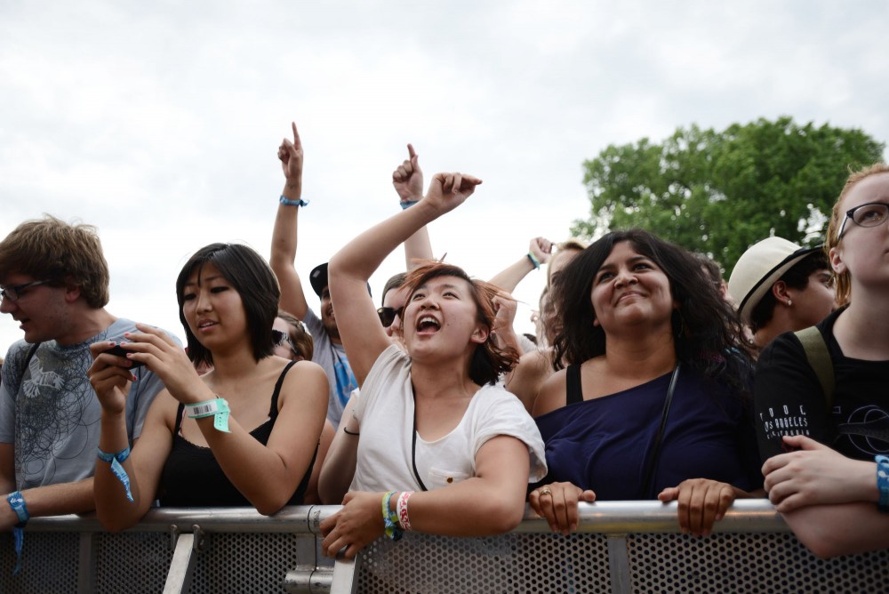 Fans cheer as Motion City Soundtrack performs at Rivers Edge Music Festival in St. Paul, Minn.