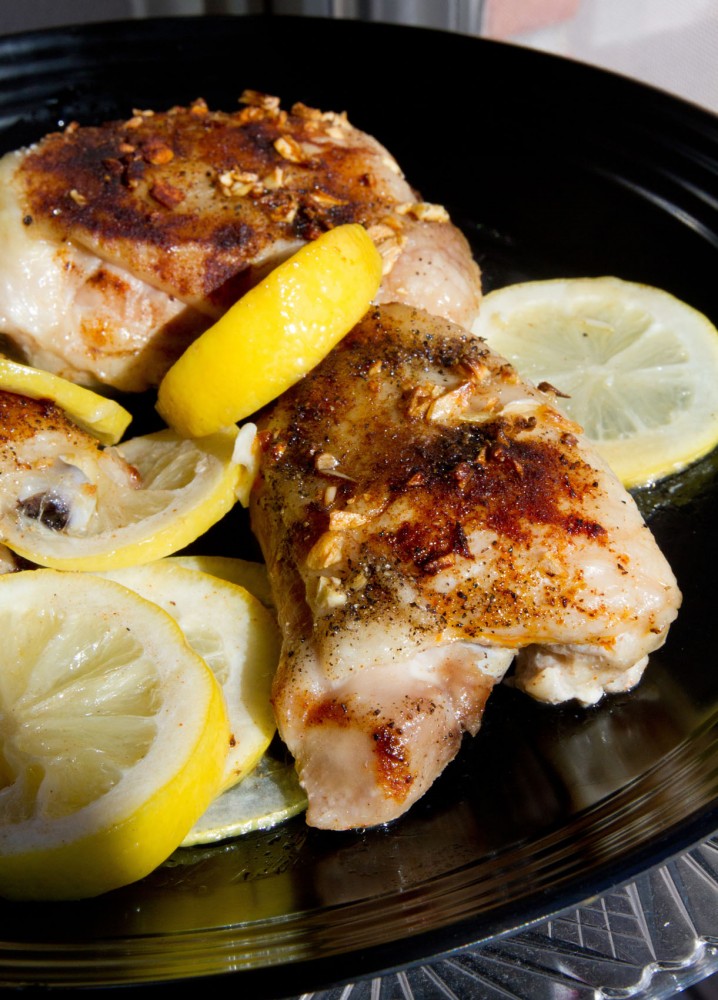 Chicken covered in a light beer sauce enhances the flavors of garlic, lemon and a spice rub that coats the dish.