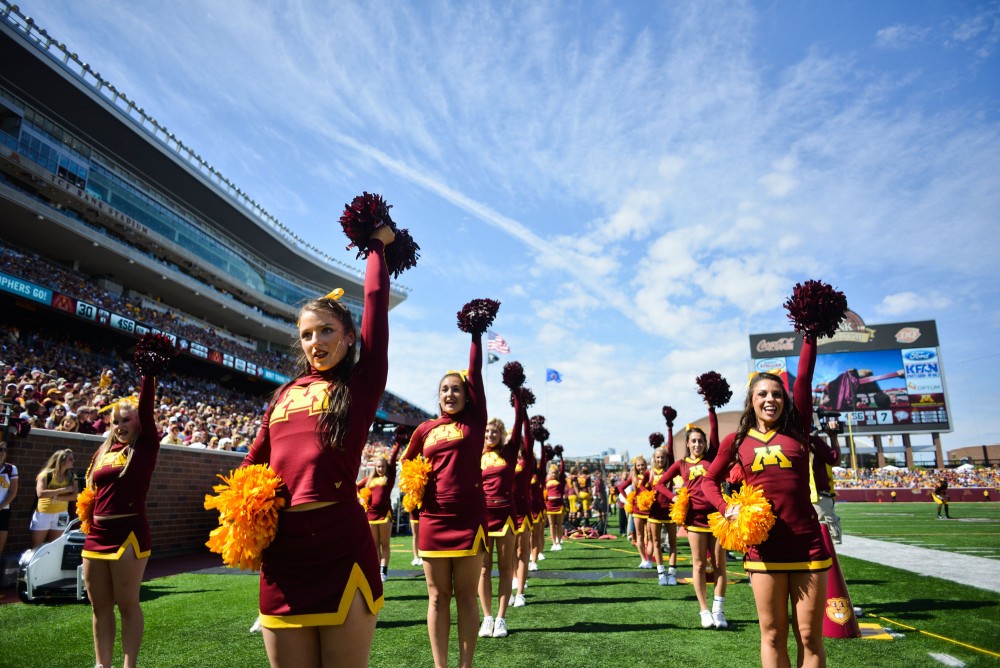 Minnesota cheerleaders rally fans during Saturday’s game against New Hampshire at TCF Bank Stadium.