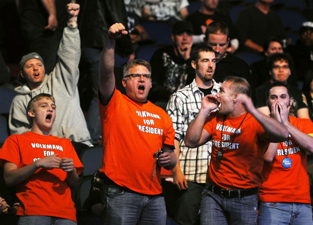 Volkmann supporters cheer during his fight Friday night at the Target Center.
