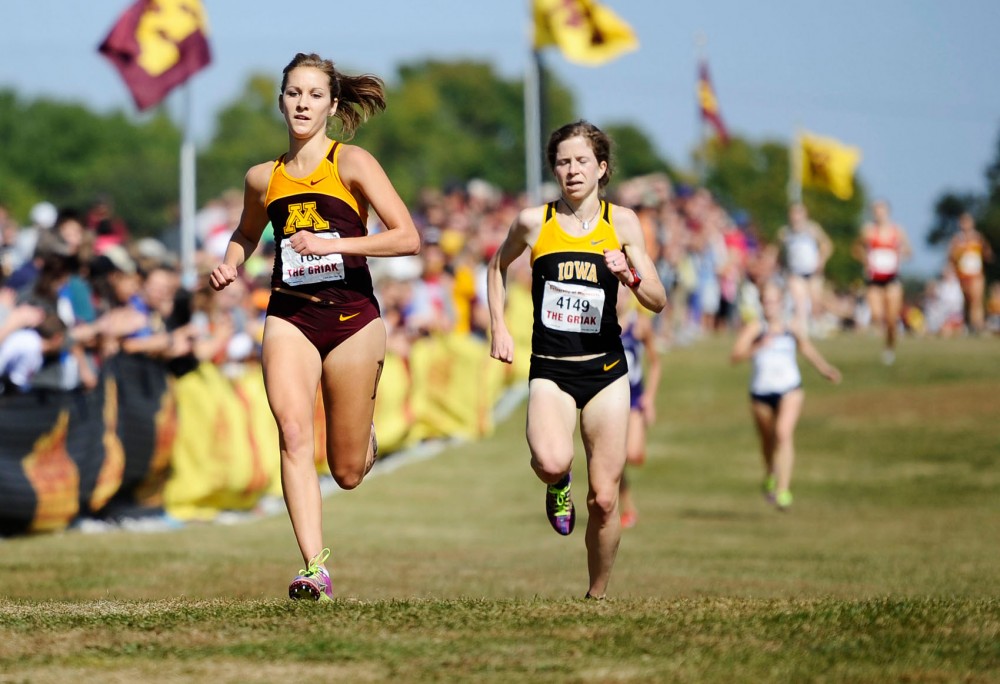 Minnesota junior Laura Docherty runs at the Jack Johnson Womens Gold - Division I on Saturday at Les Bolstad Golf Course in St. Paul, Minn. Docherty took fourth place at the Roy Griak Invitational. 