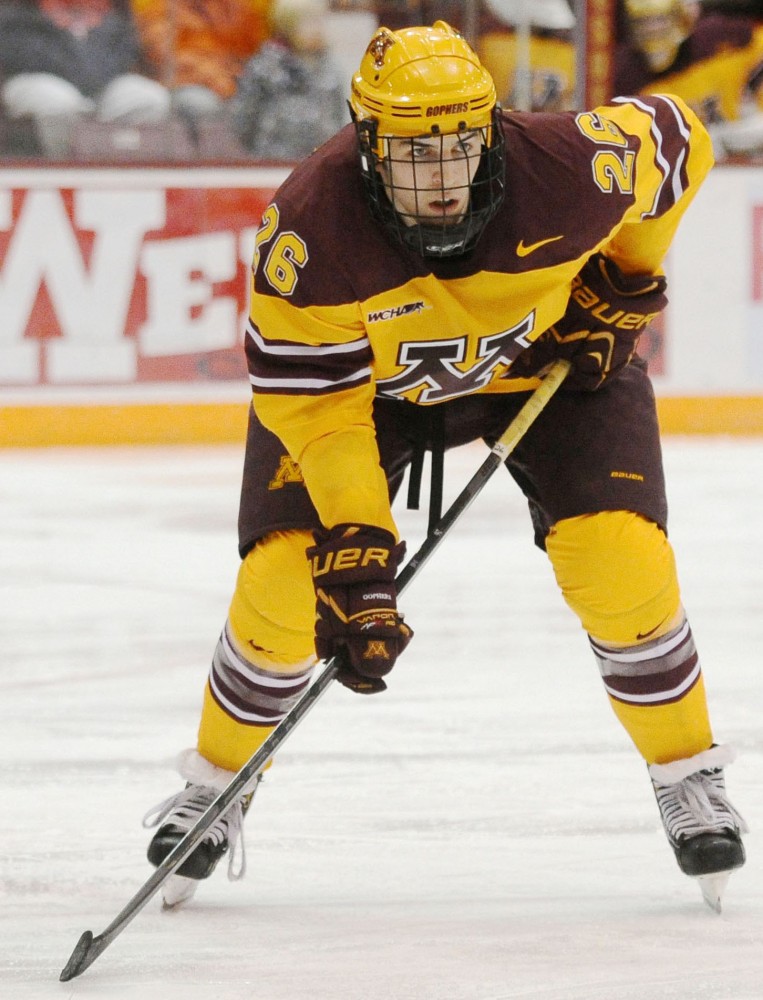 Sophomore forward Christian Isackson plays against Canisius on Sunday at Mariucci Arena.