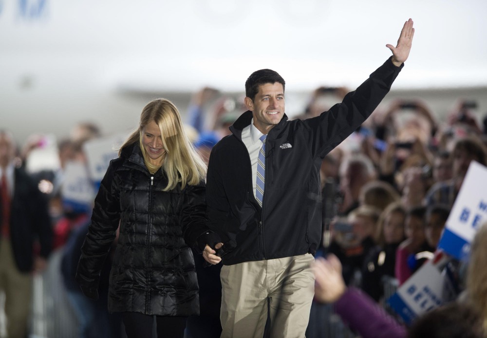 Vice presidential candidate Paul Ryan and his wife Janna Little arrive at a rally Sunday, Nov. 4, 2012,  at the Sun Country Airlines hanger at the Minneapolis/St. Paul International Airport. 