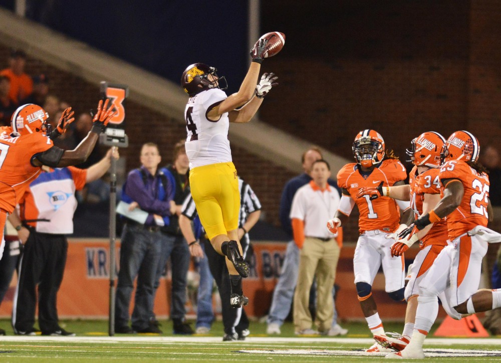 Minnesota wide receiver Isaac Fruechte (14) catches a pass from Minnesota quarterback Philip Nelson (9) on Nov. 10, 2012 at Memorial Stadium in Champaign, Ill.