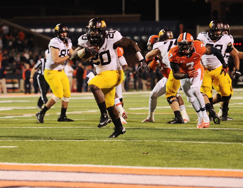 Minnesota running back Donnell Kirkwood (20) scores his second touchdown of the game against Illinois on Nov. 10, 2012 at Memorial Stadium in Champaign, Ill.