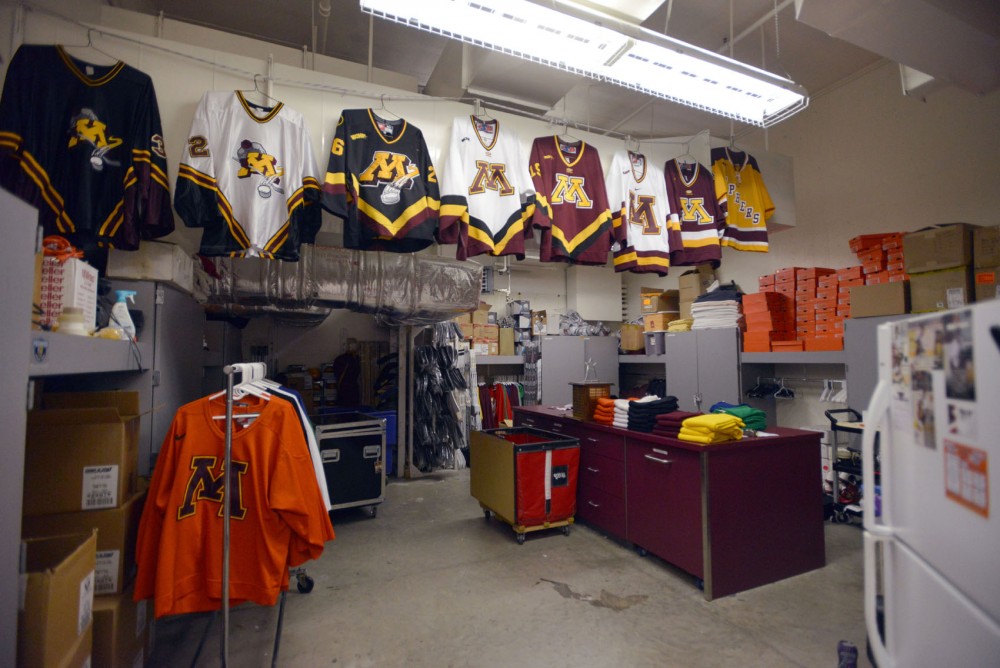 ormer jerseys hang in the womens hockey equipment room at Ridder Arena.
