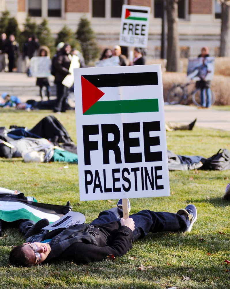 Students gather between Smith and Vincent halls during Wednesdays Students for Justice in Palestine die in.