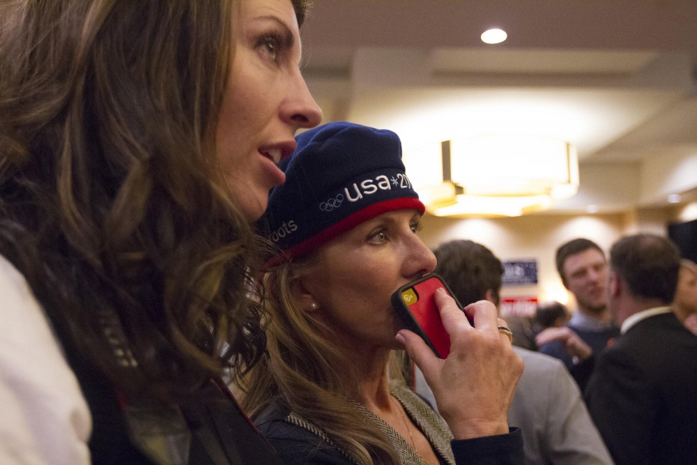 Evonne Bak, left, and Kristin Ostrander watch Fox News as doubt is cast on whether the election can be officially declared Tuesday at the GOP election night party in Bloomington, Minn.. I still hold on to faith and hope. Its too soon to give up, said Ostrander.