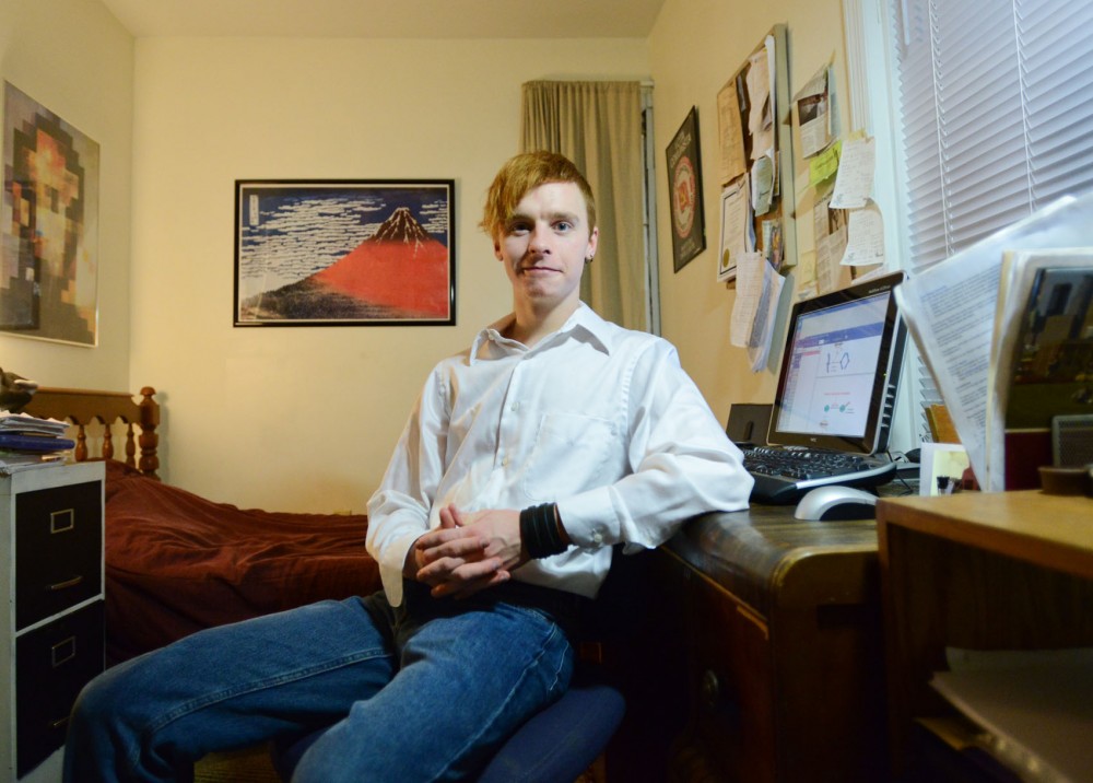 Neuroscience senior Kody Zalewski sits in his room and campaign headquarters filled with paintings and the smell of incense Tuesday at his apartment. Zalewski ran an unsuccessful bid to unseat state Rep. Phyllis Kahn in District 60B in the last election.