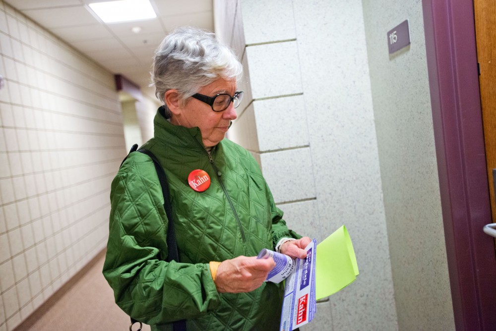 ep. Phyllis Kahn canvasses around the Florence Court Apartments near Dinkytown to promote her and Sen. Kari Dziedzic