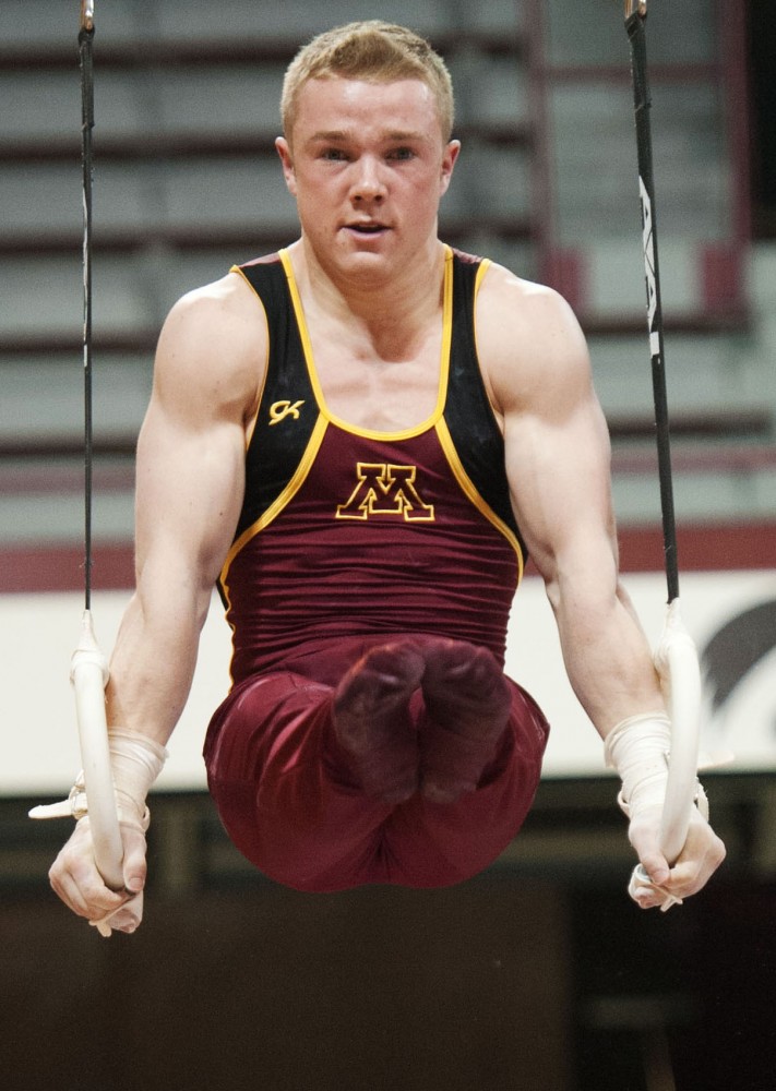 Minnesotas Sean Bauer competes on the rings Saturday, March 24, 2012, at the Sports Pavilion. Bauer competed in the NCAA championships as a freshman in the 2012 season.