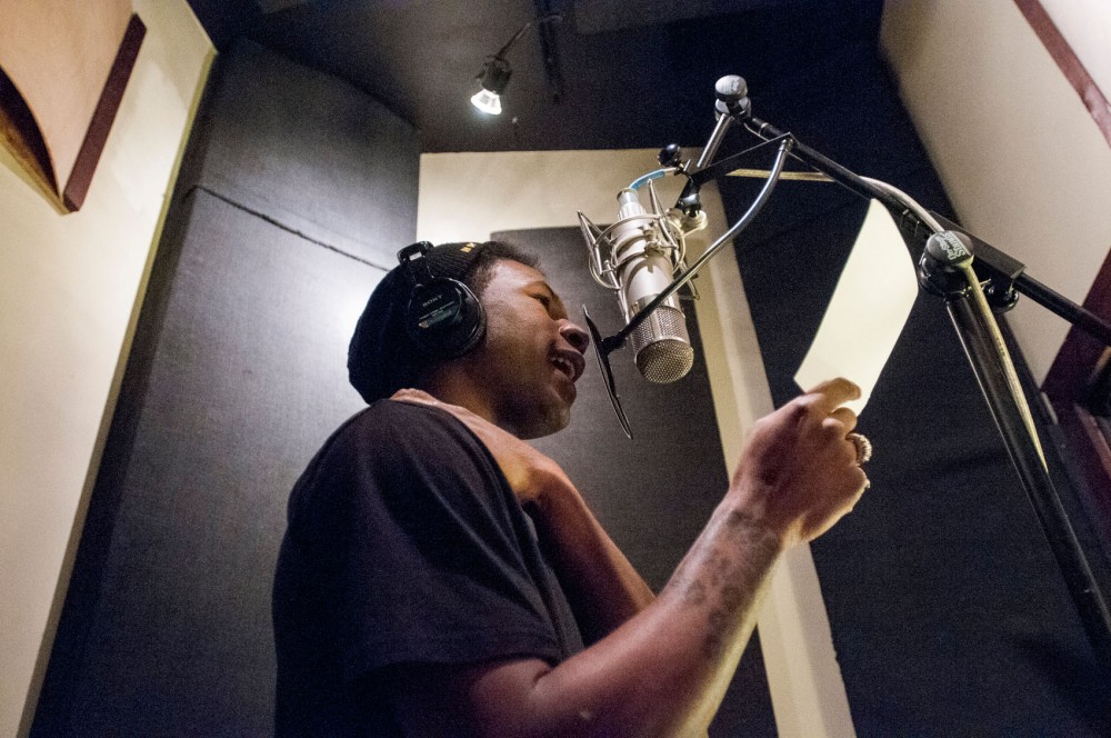 Minneapolis rapper Chris Hooks, Rapper Hooks, works on a new track on Tuesday, Feb. 26, 2013, at Waterbury Studios in Minneapolis. After four years with Spencer Wirth-Davis as The Tribe & Big Cats, Hooks and Wirth-Davis are performing one last show together at the Triple Rock on Friday.