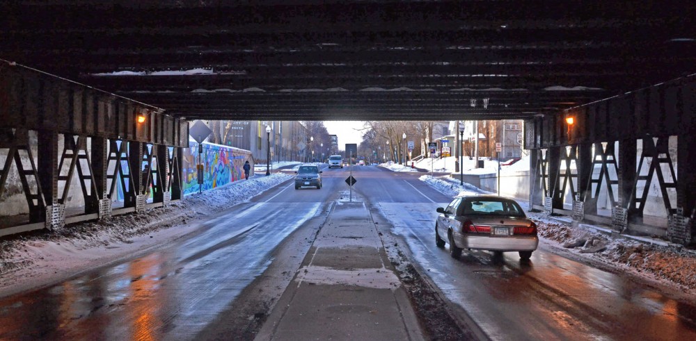 Traffic passes under the 15th Avenue railroad bridge on Tuesday, February 19, 2013, between the Como and Marcy-Holmes neighborhoods. The bridge is in poor condition according to city documents.