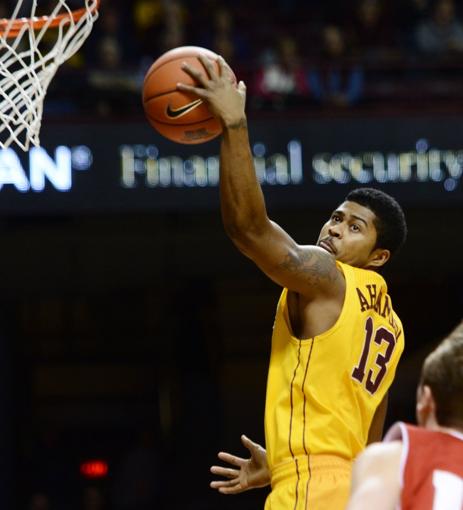 Minnesota guard Maverick Ahanmisi attempts a basket against Wisconsin on Thursday, Feb. 14, 2013, at Williams Arena. 