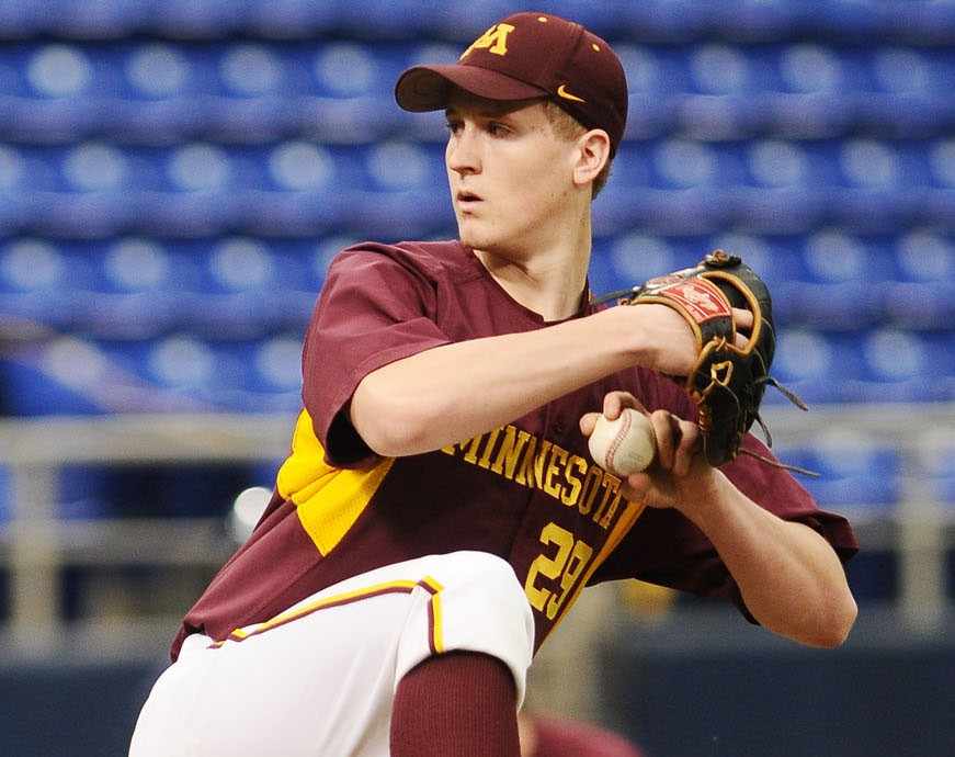 DJ Snelten pitches during Saturday evenings game against The Citadel at the Metrodome.  The Gophers had a shutout victory with a score of 3-0.