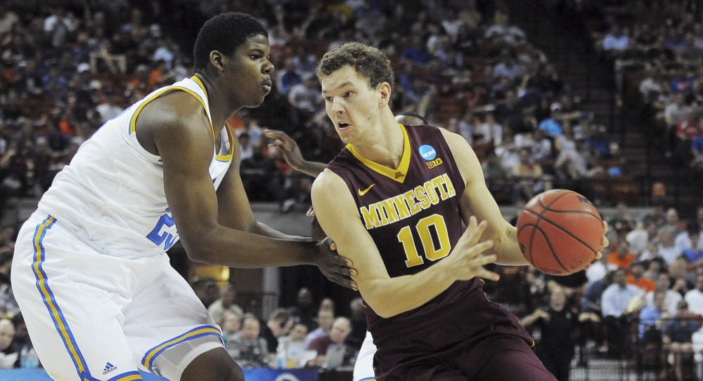 Minnesota forward Oto Osenieks charges the ball at the Frank Erwin Center against UCLA.