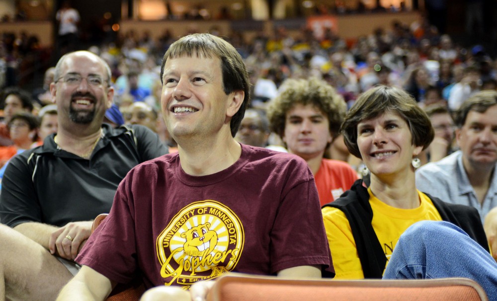 Minnesota alum and Austin resident Mark Trutna waits for the start of the Gopher vs Bruins game on Friday, March 22, 2013 at the Frank Erwin Center in Austin, Texas.