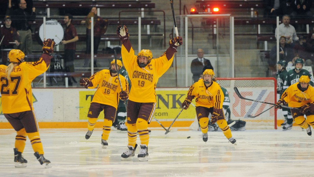 Minnesota players cheer after scoring their fourth goal against Bemidji State on Saturday, March 2, 2013, at Ridder Arena. The Gophers crushed Bemidji State 8-0 to advance to the WCHA Final Face-Off next weekend.